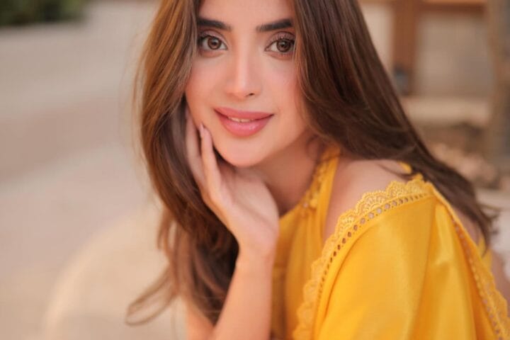Saboor Aly Dazzles in Vibrant Yellow Silk Saree with Sunflower Aesthetic